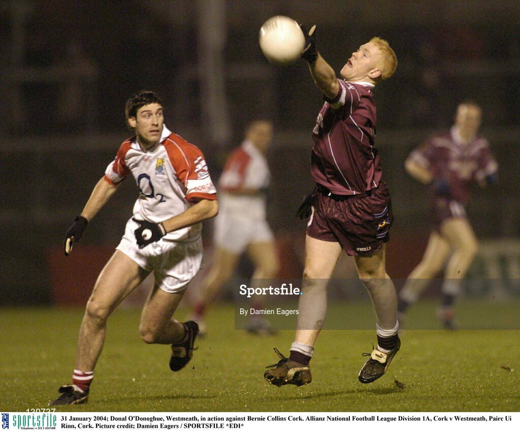 31 January 2004; Donal O'Donoghue, Westmeath, in action against Bernie Collins Cork. Allianz National Football League Division 1A, Cork v Westmeath, Pairc Ui Rinn, Cork. Picture credit; Damien Eagers / SPORTSFILE *EDI*