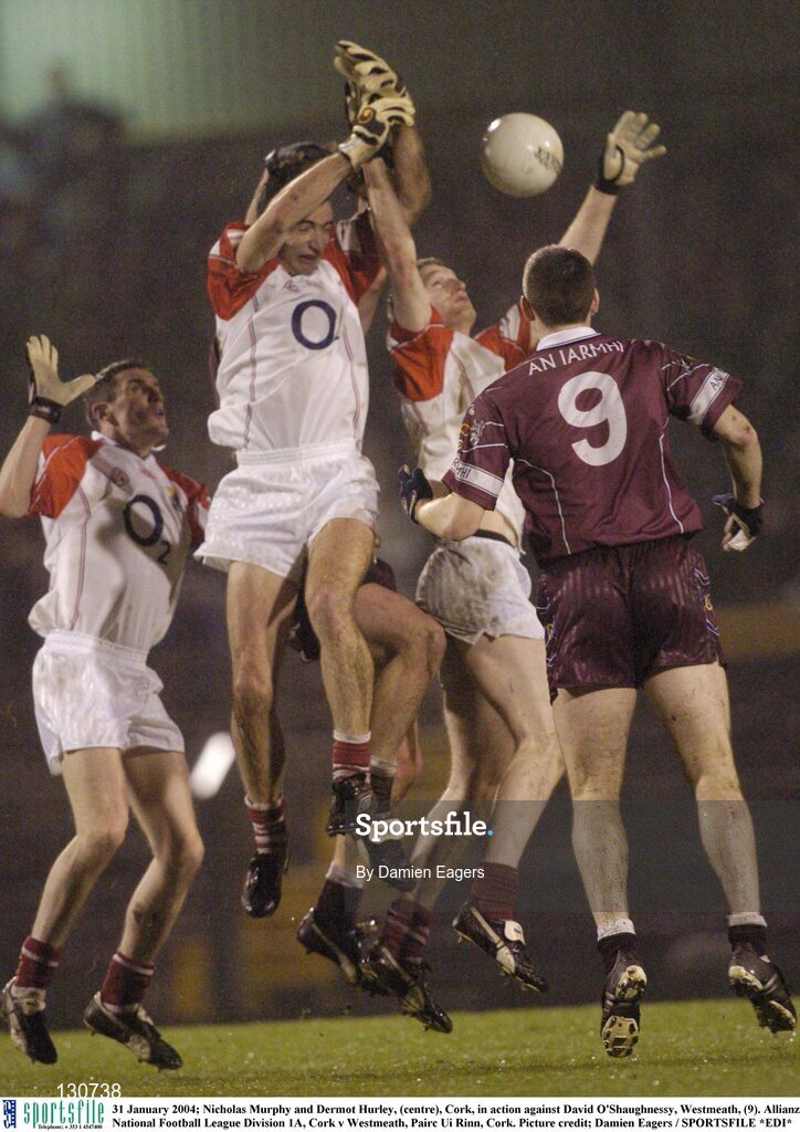 31 January 2004; Nicholas Murphy and Dermot Hurley, (centre), Cork, in action against David O'Shaughnessy, Westmeath, (9). Allianz National Football League Division 1A, Cork v Westmeath, Pairc Ui Rinn, Cork. Picture credit; Damien Eagers / SPORTSFILE *EDI*