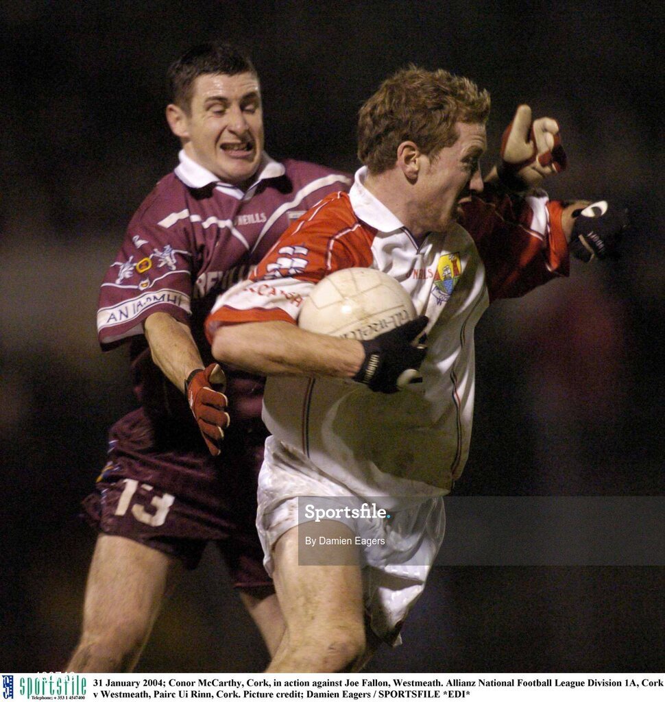 31 January 2004; Conor McCarthy, Cork, in action against Joe Fallon, Westmeath. Allianz National Football League Division 1A, Cork v Westmeath, Pairc Ui Rinn, Cork. Picture credit; Damien Eagers / SPORTSFILE *EDI*