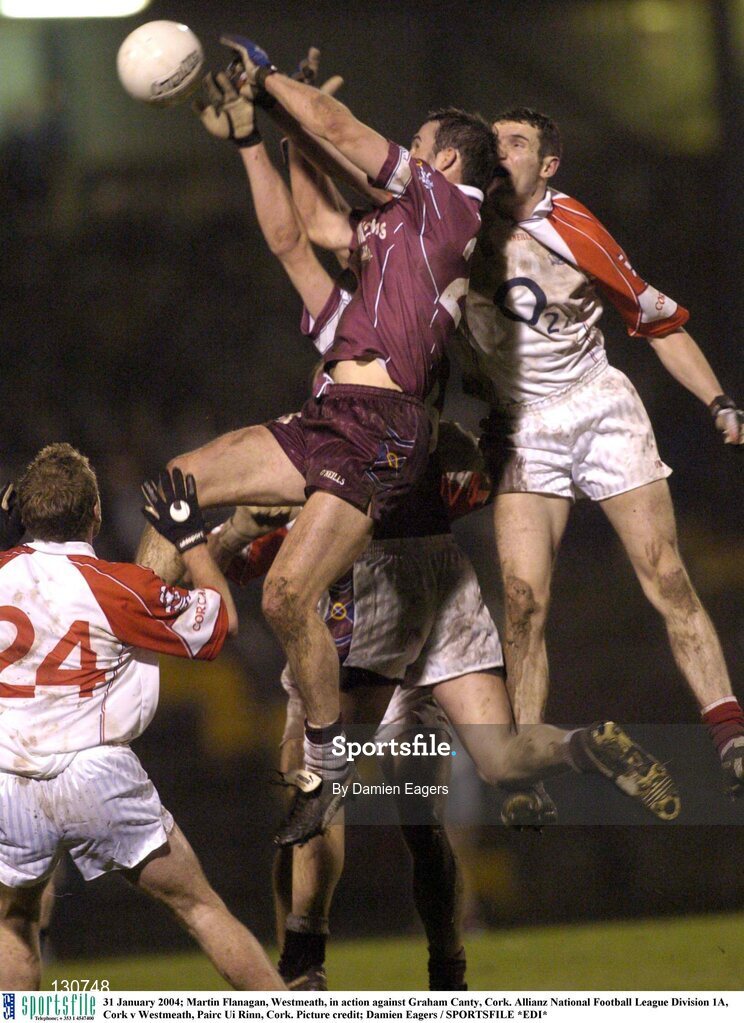 31 January 2004; Martin Flanagan, Westmeath, in action against Graham Canty, Cork. Allianz National Football League Division 1A, Cork v Westmeath, Pairc Ui Rinn, Cork. Picture credit; Damien Eagers / SPORTSFILE *EDI*
