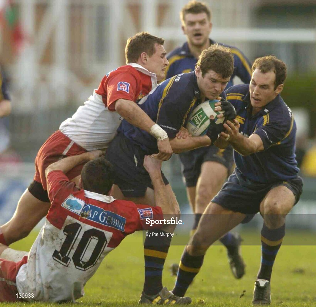 31 January 2004; Gordon D'Arcy, Leinster Lions, assisted by team-mate Girvan Dempsey, right, in action against Nicolas Brusque, and Julien Peyrelongue, 10, Biarritz Olympique. Heineken European Cup 2003-2004, Pool 3, Round 6, Biarritz Olympique v Leinster Lions, Parc des Sports Aguilera, Biarritz, France. Picture credit; Pat Murphy / SPORTSFILE *EDI*