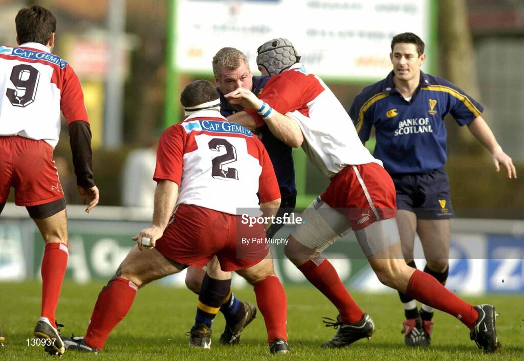 31 January 2004; Victor Costello, Leinster Lions, in action against Herve Manet, right, Jean Michel Gonzalez, 2, and Dimitri Yachvili, Biarritz Olympique. Heineken European Cup 2003-2004, Pool 3, Round 6, Biarritz Olympique v Leinster Lions, Parc des Sports Aguilera, Biarritz, France. Picture credit; Pat Murphy / SPORTSFILE *EDI*