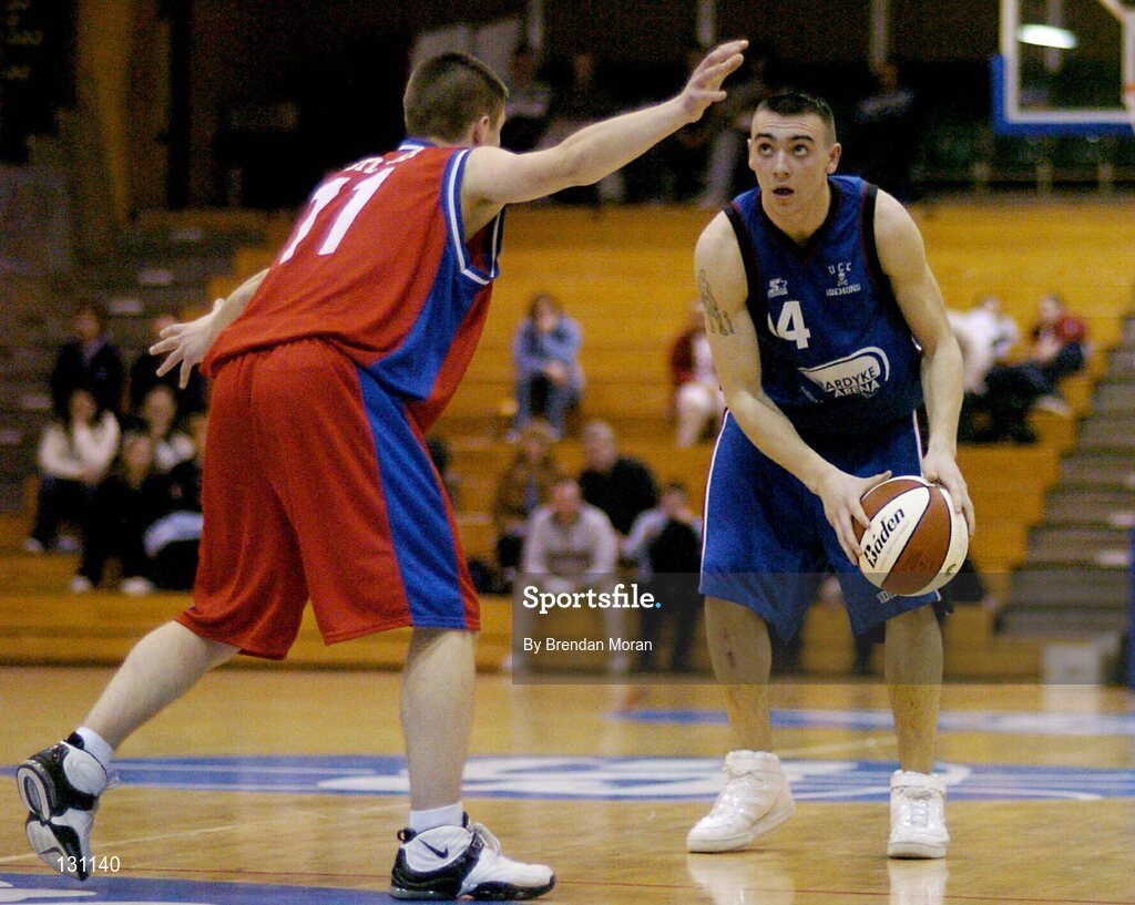 30 January 2004; Niall Murphy, Mardyke UCC Demons, in action against Daire Conway, Westaro Castlebar. National Basketball Cup 2004, Junior Men's Semi-Final, Mardyke UCC Demons v Westaro Castlebar, The ESB Arena, Tallaght, Dublin. Picture credit; Brendan Moran / SPORTSFILE *EDI*