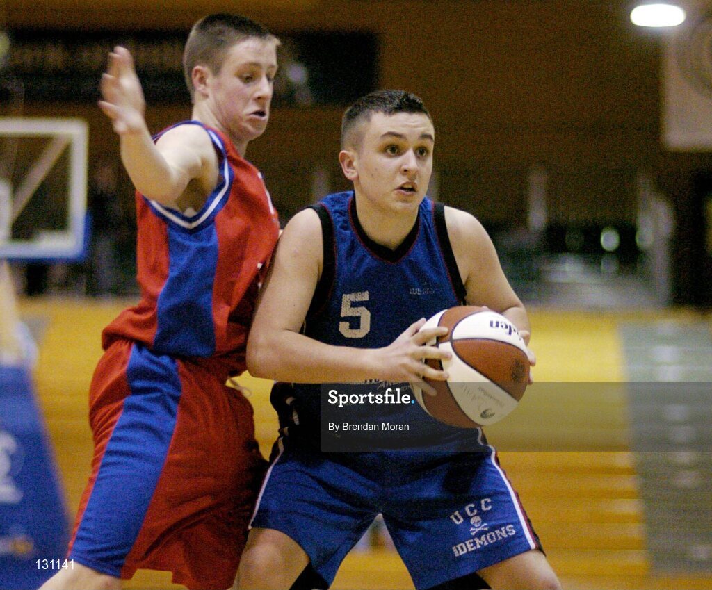 30 January 2004; Cathal O'Flaherty, Mardyke UCC Demons, in action against Daire Conway, Westaro Castlebar. National Basketball Cup 2004, Junior Men's Semi-Final, Mardyke UCC Demons v Westaro Castlebar, The ESB Arena, Tallaght, Dublin. Picture credit; Brendan Moran / SPORTSFILE *EDI*