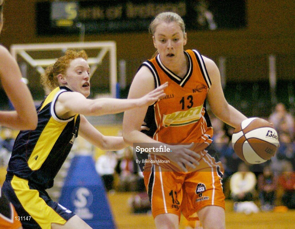 30 January 2004; Suzanne Maguire, Dart Killester, in action against Jillian Aherne, University of Limerick. ESB National Cup 2004, Senior Women's Semi-Final, University of Limerick v Dart Killester, The ESB Arena, Tallaght, Dublin. Picture credit; Brendan Moran / SPORTSFILE *EDI*