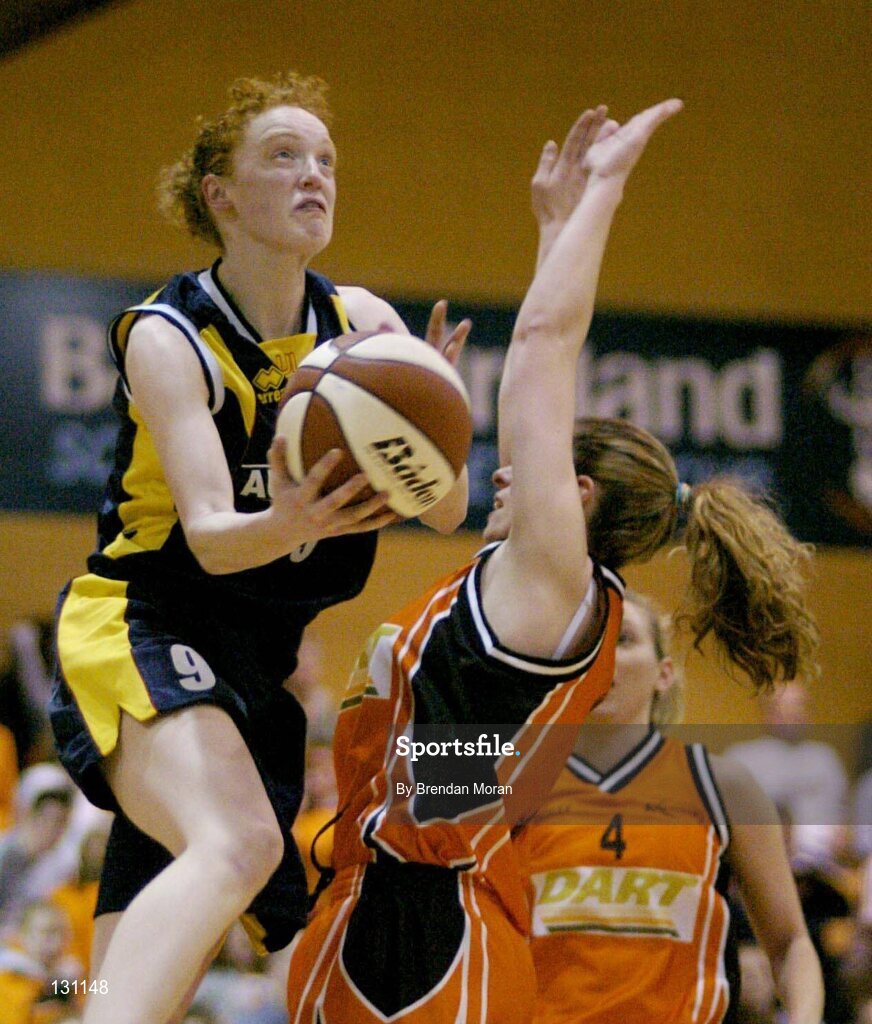 30 January 2004; Jillian Aherne, University of Limerick, in action against Dart Killester's Sinead Vaughan. ESB National Cup 2004, Senior Women's Semi-Final, University of Limerick v Dart Killester, The ESB Arena, Tallaght, Dublin. Picture credit; Brendan Moran / SPORTSFILE *EDI*