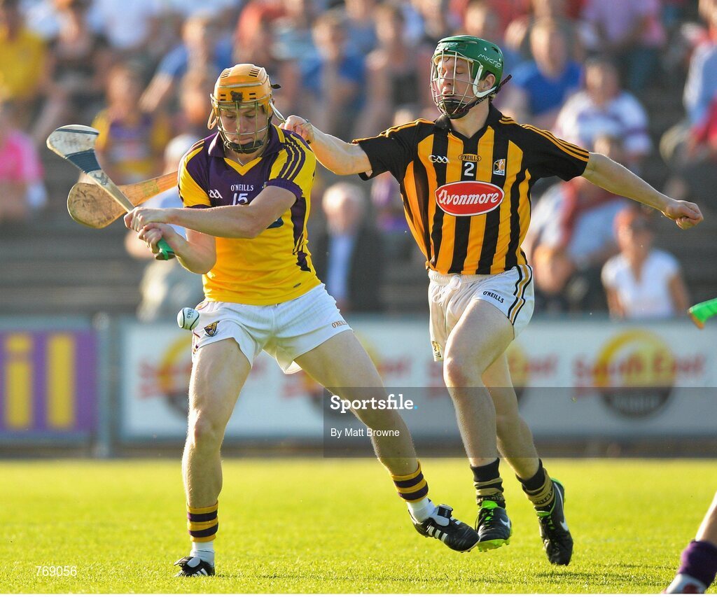 10 July 2013; Rhys Clarke, Wexford, in action against Pat Carroll, Kilkenny. Bord Gáis Energy Leinster GAA Hurling Under 21 Championship Final, Kilkenny v Wexford, Wexford Park, Wexford. Picture credit: Matt Browne / SPORTSFILE