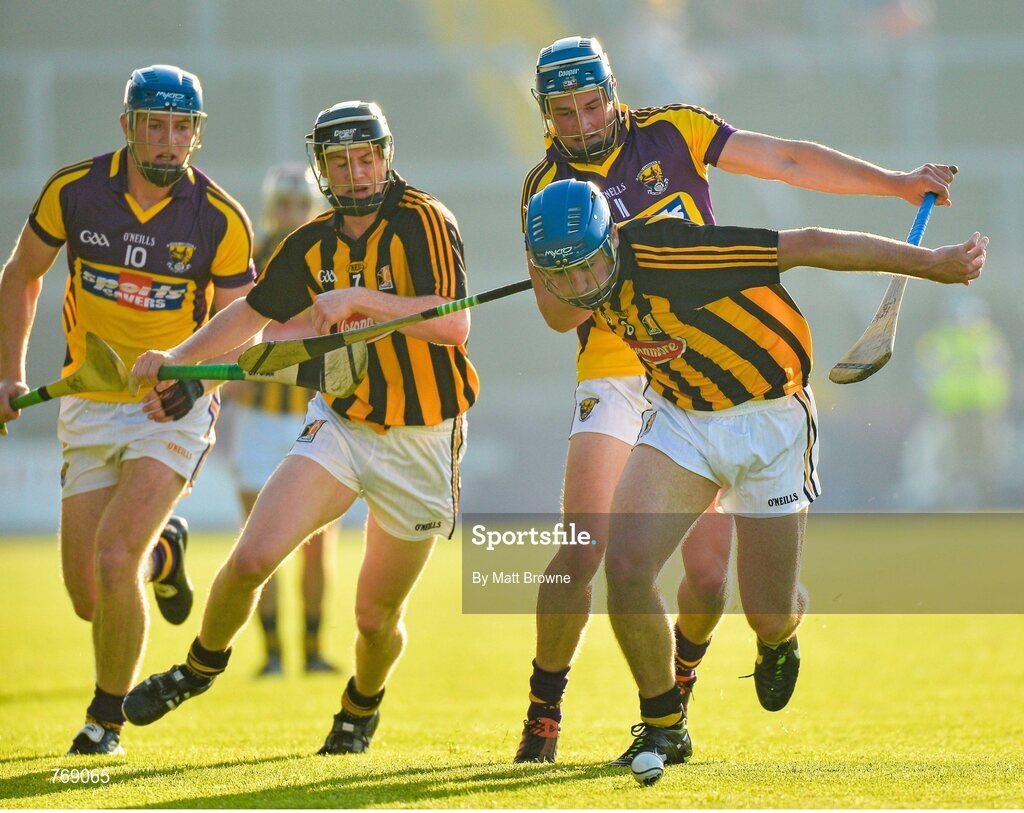 10 July 2013; Luke Harney, right, and Owen McGrath, Kilkenny, in action against Ian Byrne and Jack Guiney, left, Wexford. Bord Gáis Energy Leinster GAA Hurling Under 21 Championship Final, Kilkenny v Wexford, Wexford Park, Wexford. Picture credit: Matt Browne / SPORTSFILE