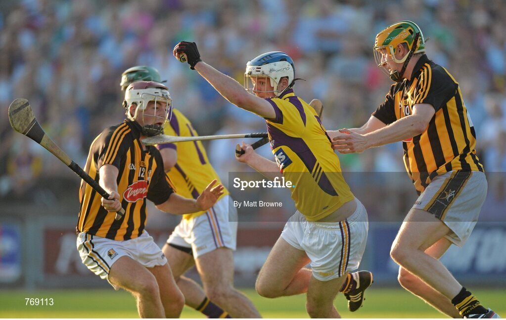 10 July 2013; Shane O'Gorman, Wexford, in action against John Power, left, and Kevin Kelly, Kilkenny. Bord Gáis Energy Leinster GAA Hurling Under 21 Championship Final, Kilkenny v Wexford, Wexford Park, Wexford. Picture credit: Matt Browne / SPORTSFILE