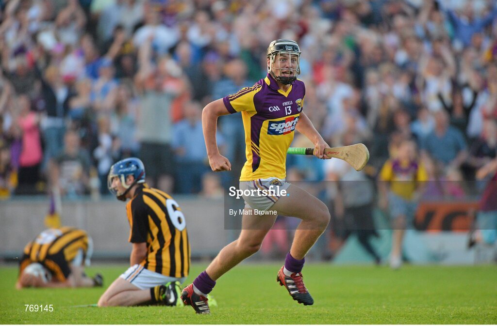 10 July 2013; Wexford's Conor McDonald celebrates at the final whistle as Kilkenny's Padraig Walsh, left, and Luke Harney drop to their knees. Bord Gáis Energy Leinster GAA Hurling Under 21 Championship Final, Kilkenny v Wexford, Wexford Park, Wexford. Picture credit: Matt Browne / SPORTSFILE