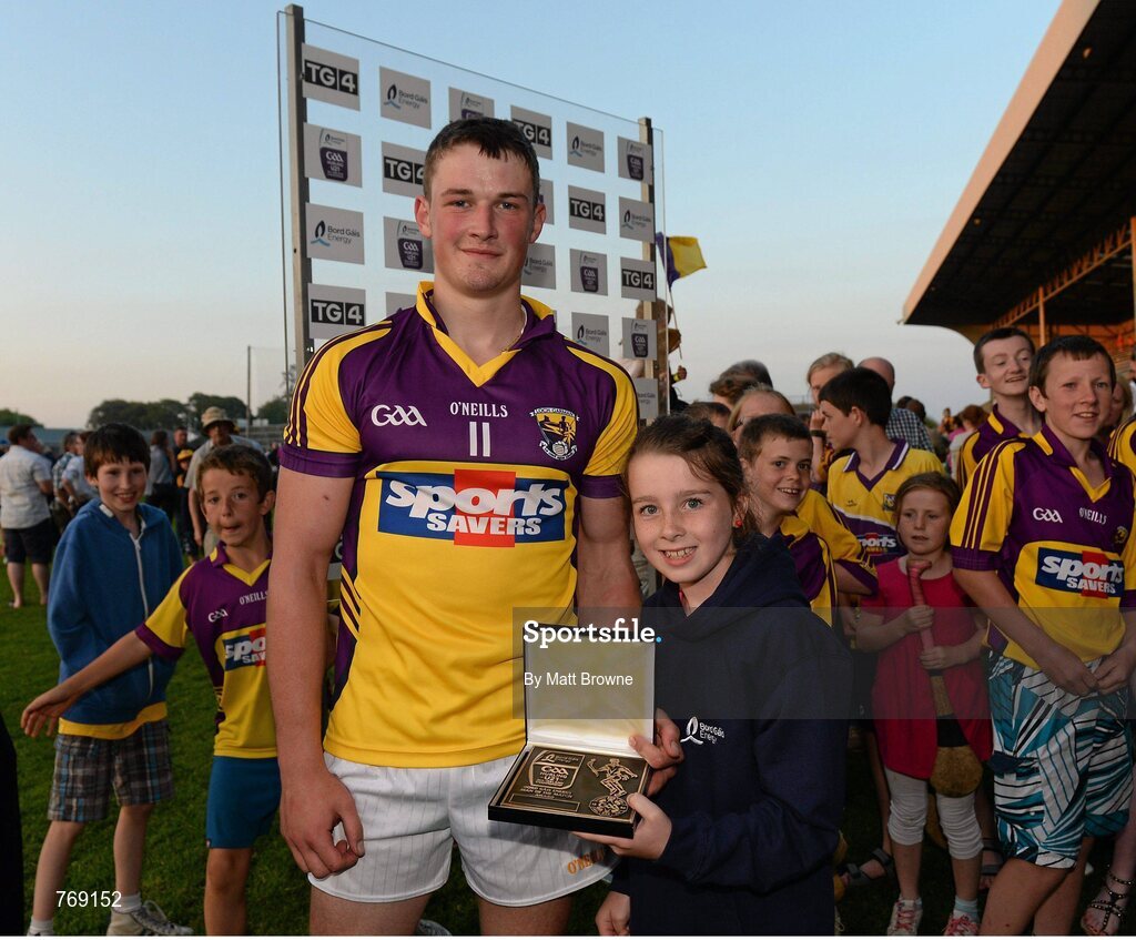 10 July 2013; Ian Byrne, Wexford, is presented with his Man of the Match award by nine year old Chloe Casey, from Co. Kerry. Bord Gáis Energy Leinster GAA Hurling Under 21 Championship Final, Kilkenny v Wexford, Wexford Park, Wexford. Picture credit: Matt Browne / SPORTSFILE