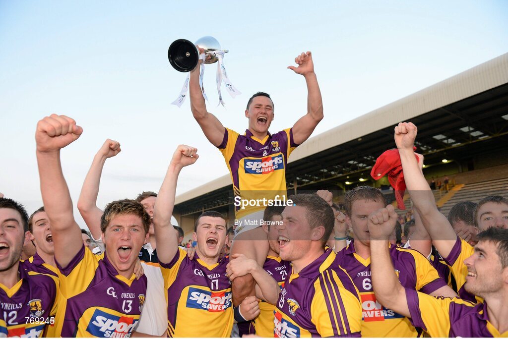 10 July 2013; Wexford captain Lee Chin lifts the Robbins Cup as his team-mates celebrate. Bord Gáis Energy Leinster GAA Hurling Under 21 Championship Final, Kilkenny v Wexford, Wexford Park, Wexford. Picture credit: Matt Browne / SPORTSFILE