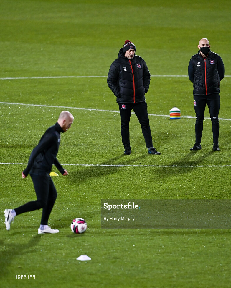 12 March 2021; Dundalk coach Filippo Giovagnoli and Dundalk strength & conditioning coach Graham Norton watch the warm-up prior to the FAI President's Cup Final match between Shamrock Rovers and Dundalk at Tallaght Stadium in Dublin. Photo by Harry Murphy/Sportsfile