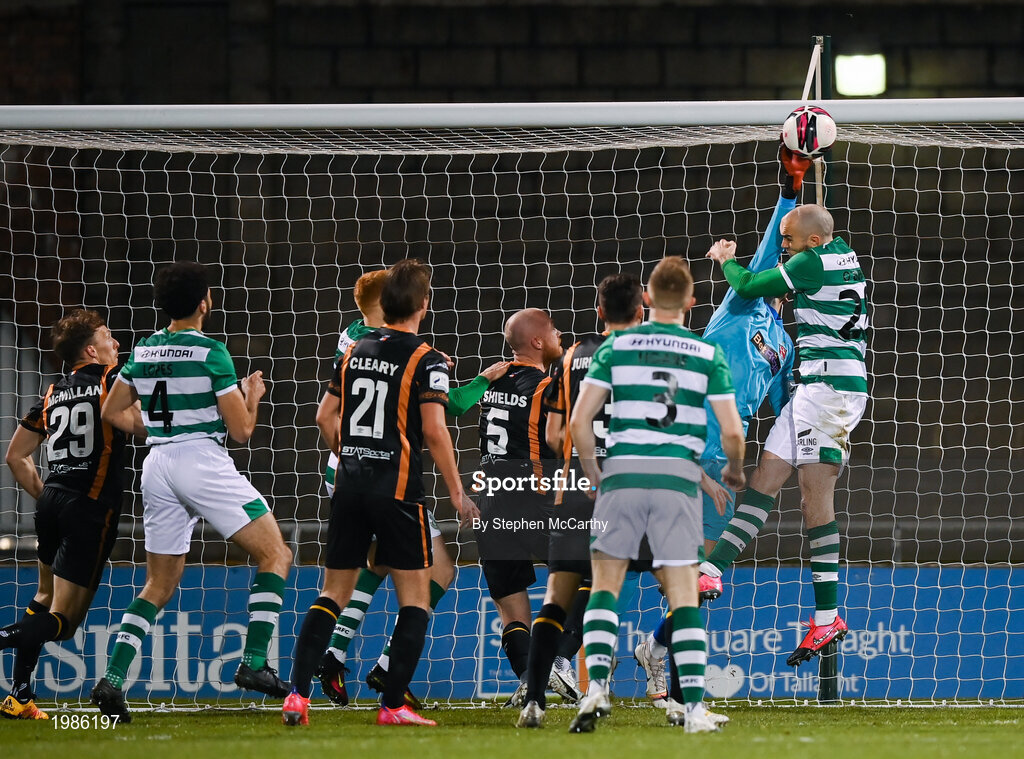 12 March 2021; Dundalk goalkeeper Alessio Abibi clears ahead of Joey O'Brien of Shamrock Rovers during the FAI President's Cup Final match between Shamrock Rovers and Dundalk at Tallaght Stadium in Dublin. Photo by Stephen McCarthy/Sportsfile