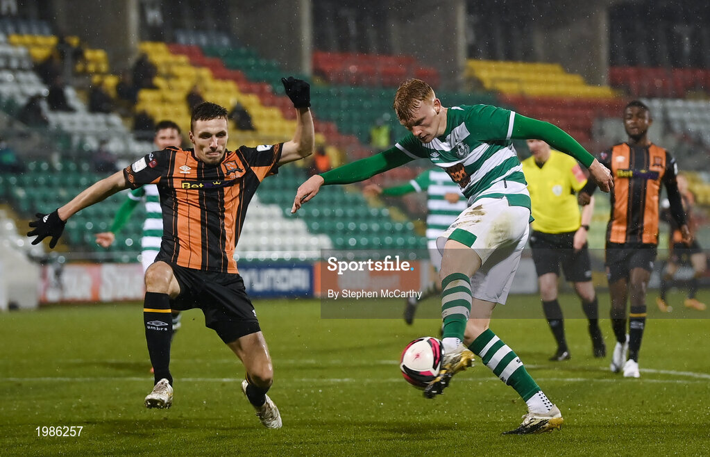 12 March 2021; Liam Scales of Shamrock Rovers shoots to score his side's first goal despite the attention of Raivis Jurkovskis of Dundalk during the FAI President's Cup Final match between Shamrock Rovers and Dundalk at Tallaght Stadium in Dublin. Photo by Stephen McCarthy/Sportsfile