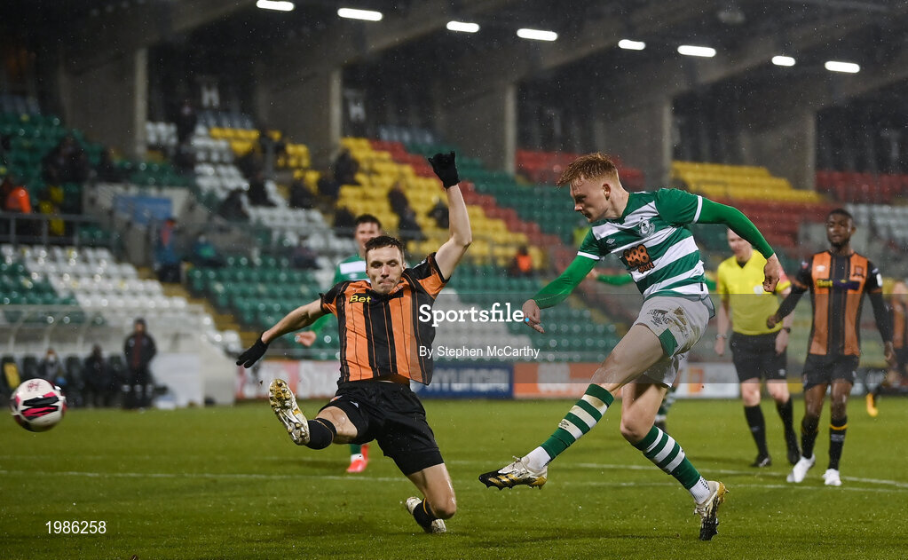 12 March 2021; Liam Scales of Shamrock Rovers shoots to score his side's first goal despite the attention of Raivis Jurkovskis of Dundalk during the FAI President's Cup Final match between Shamrock Rovers and Dundalk at Tallaght Stadium in Dublin. Photo by Stephen McCarthy/Sportsfile