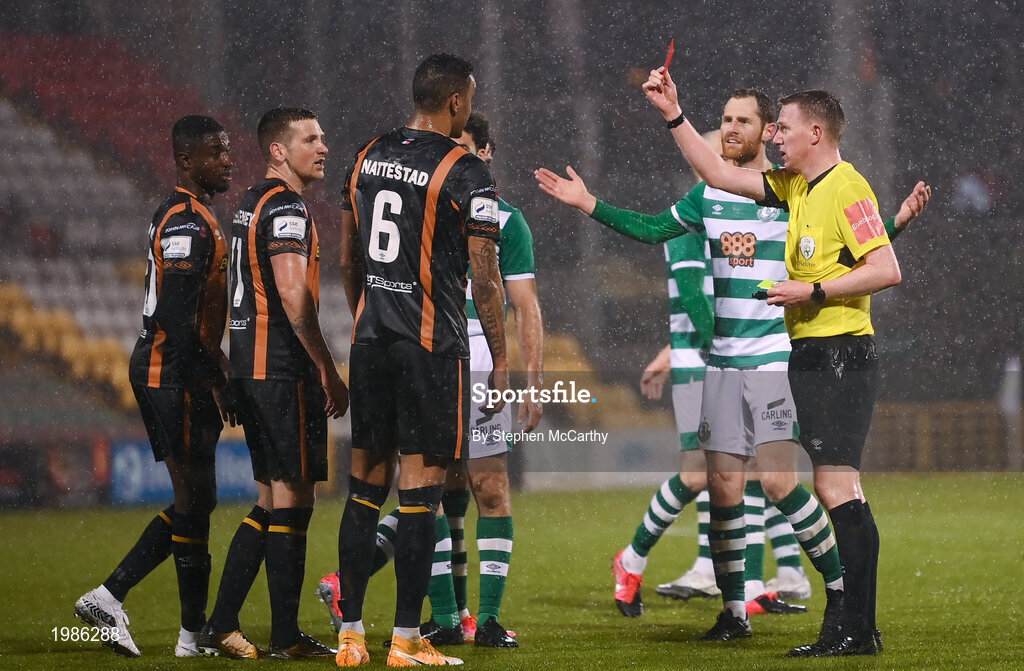 12 March 2021; Referee Damien McGrath issues a red card to Sonni Nattestad, 6, of Dundalk during the FAI President's Cup Final match between Shamrock Rovers and Dundalk at Tallaght Stadium in Dublin. Photo by Stephen McCarthy/Sportsfile