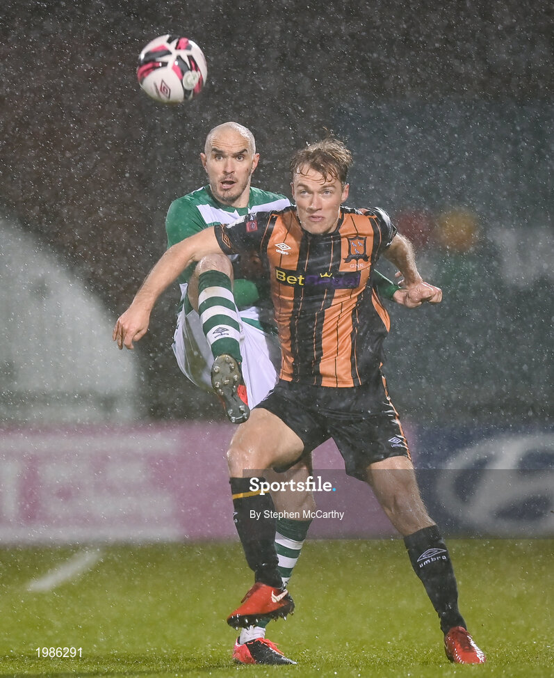 12 March 2021; Greg Sloggett of Dundalk in action against Joey O'Brien of Shamrock Rovers during the FAI President's Cup Final match between Shamrock Rovers and Dundalk at Tallaght Stadium in Dublin. Photo by Stephen McCarthy/Sportsfile