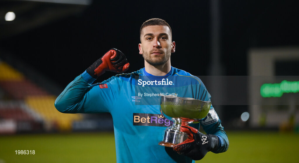 12 March 2021; Dundalk goalkeeper Alessio Abibi celebrates with the FAI President's Cup following the FAI President's Cup Final match between Shamrock Rovers and Dundalk at Tallaght Stadium in Dublin. Photo by Stephen McCarthy/Sportsfile