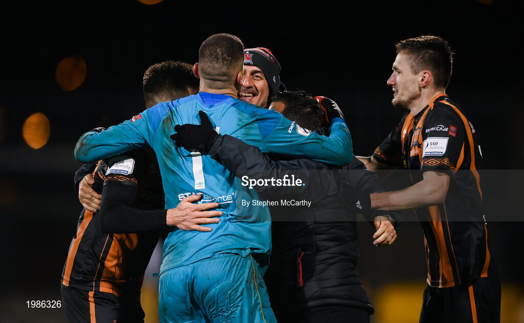 12 March 2021; Dundalk goalkeeper Alessio Abibi celebrates with Dundalk coaches Filippo Giovagnoli, centre, Giuseppi Rossi and team-mates Darragh Leahy, left, and Raivis Jurkovskis following the FAI President's Cup Final match between Shamrock Rovers and Dundalk at Tallaght Stadium in Dublin. Photo by Stephen McCarthy/Sportsfile