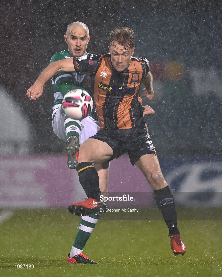 12 March 2021; Greg Sloggett of Dundalk in action against Joey O'Brien of Shamrock Rovers during the FAI President's Cup Final match between Shamrock Rovers and Dundalk at Tallaght Stadium in Dublin. Photo by Stephen McCarthy/Sportsfile