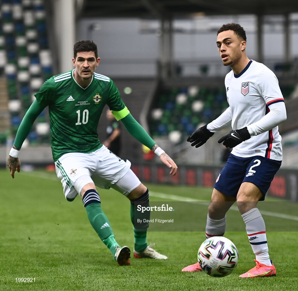 28 March 2021; Sergiño Dest of USA in action against Kyle Lafferty of Northern Ireland during the International friendly match between Northern Ireland and USA at the National Football Stadium at Windsor Park in Belfast. Photo by David Fitzgerald/Sportsfile