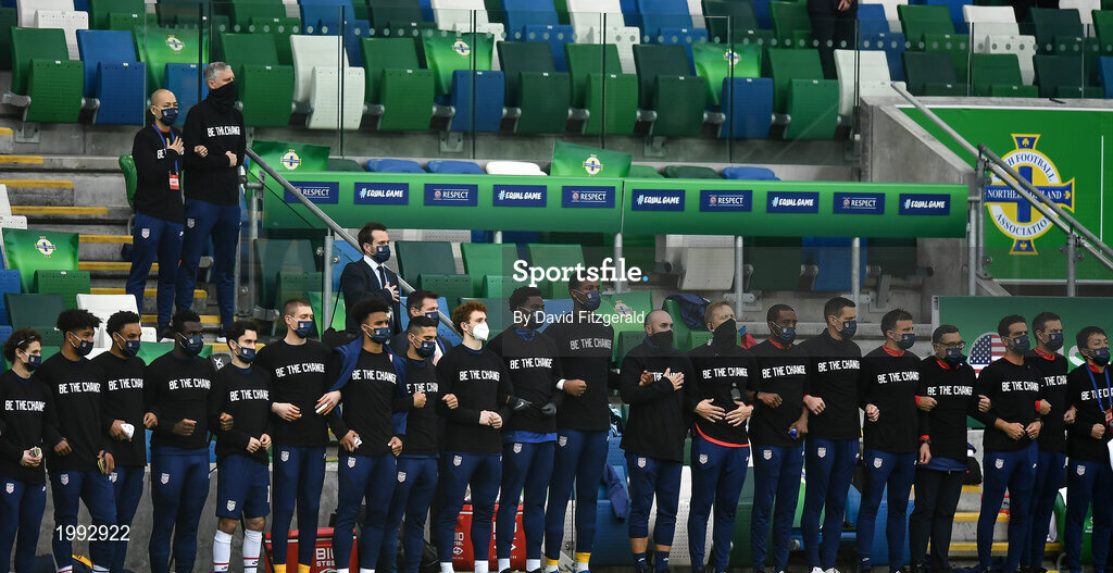 28 March 2021; The USA team stand for the National Anthem, wearing t-shirts reading 'Be The Change', prior to the International friendly match between Northern Ireland and USA at the National Football Stadium at Windsor Park in Belfast. Photo by David Fitzgerald/Sportsfile