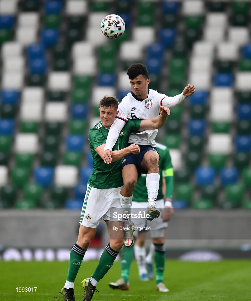 28 March 2021; Antonee Robinson of USA in action against Daniel Ballard of Northern Ireland during the International friendly match between Northern Ireland and USA at the National Football Stadium at Windsor Park in Belfast. Photo by David Fitzgerald/Sportsfile