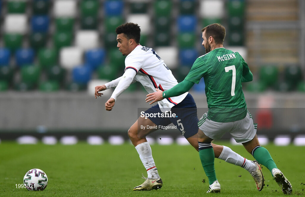 28 March 2021; Antonee Robinson of USA in action against Niall McGinn of Northern Ireland during the International friendly match between Northern Ireland and USA at the National Football Stadium at Windsor Park in Belfast. Photo by David Fitzgerald/Sportsfile