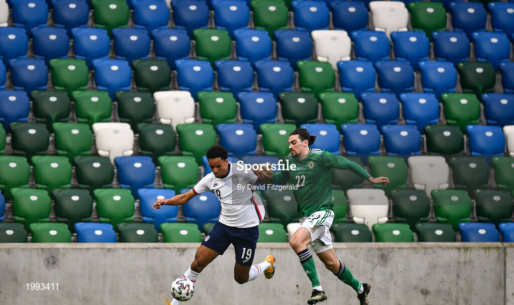 28 March 2021; Bryan Reynolds of USA in action against Ciaron Brown of Northern Ireland during the International friendly match between Northern Ireland and USA at National Football Stadium at Windsor Park in Belfast. Photo by David Fitzgerald/Sportsfile
