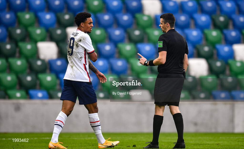 28 March 2021; Bryan Reynolds of USA and Referee Robert Ian Jenkins during the International friendly match between Northern Ireland and USA at National Football Stadium at Windsor Park in Belfast. Photo by David Fitzgerald/Sportsfile