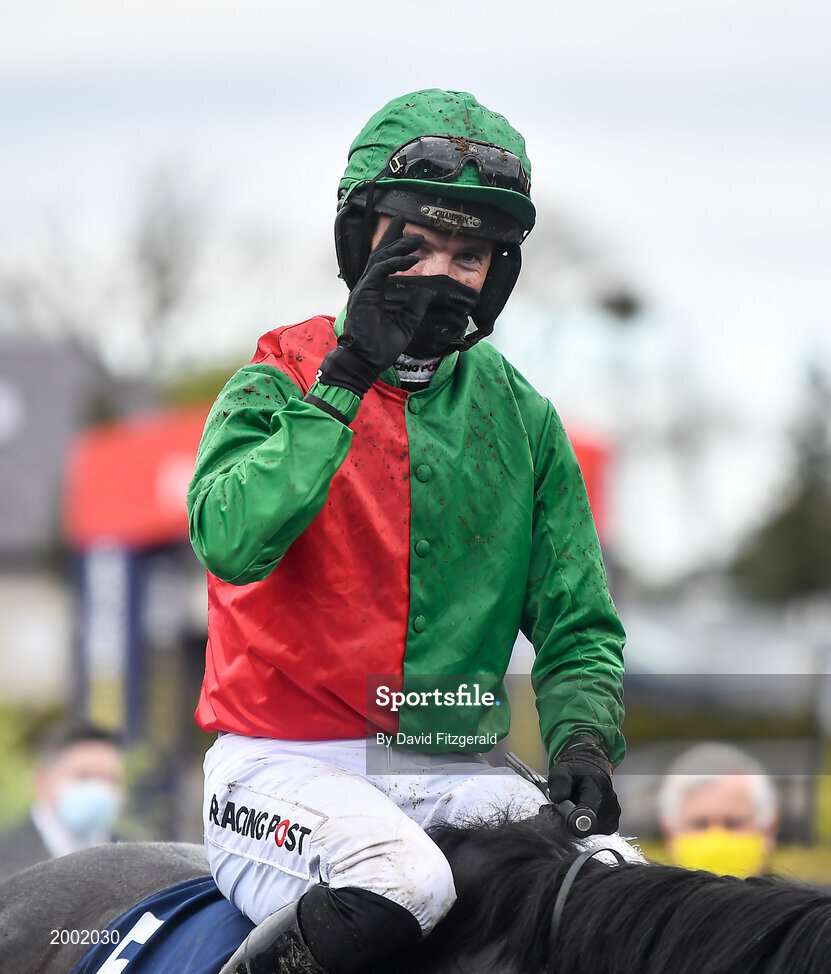 27 April 2021; Jockey Patrick Mullins celebrates after winning the eCOMM Merchant Solutions Champion Novice Hurdle on Echoes in Rain during day one of the Punchestown Festival at Punchestown Racecourse in Kildare. Photo by David Fitzgerald/Sportsfile