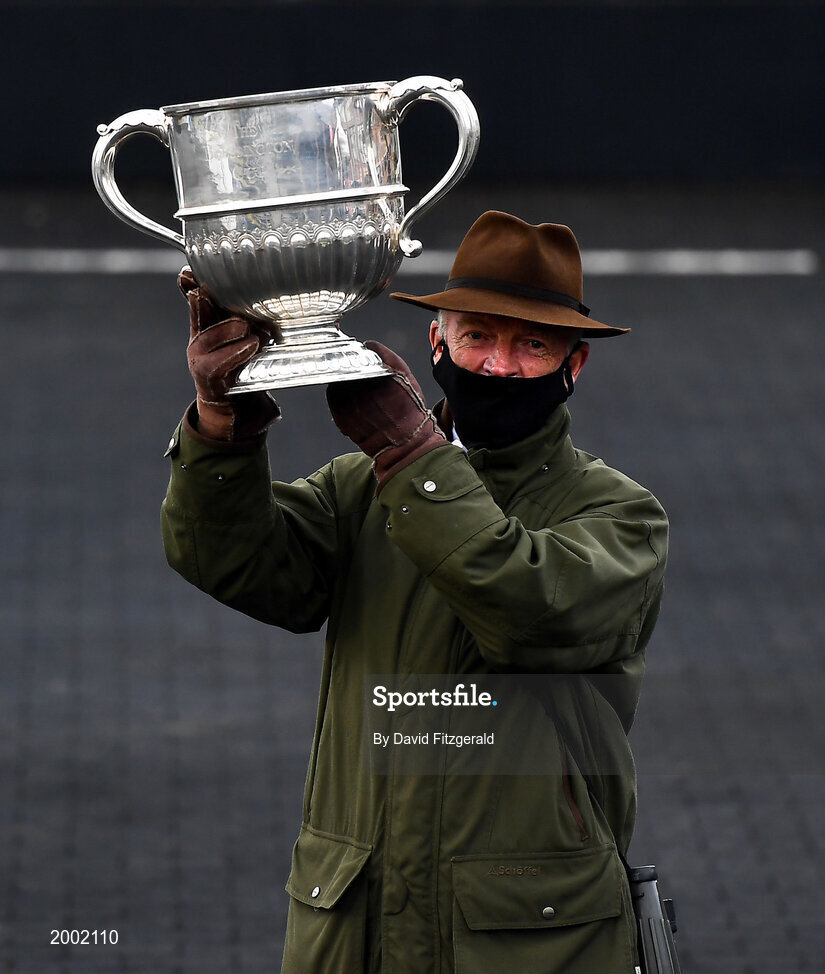 27 April 2021; Trainer Willie Mullins celebrates with the cup after sending out Chacun Pour Soi to win the William Hill Champion Steeplechase during day one of the Punchestown Festival at Punchestown Racecourse in Kildare. Photo by David Fitzgerald/Sportsfile