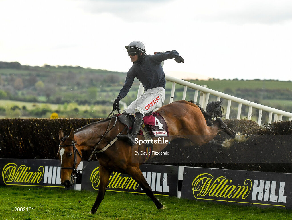 27 April 2021; Colreevy, with Danny Mullins up, jump the last on their way to winning the Dooley Insurance Champion Novice Steeplechase during day one of the Punchestown Festival at Punchestown Racecourse in Kildare. Photo by David Fitzgerald/Sportsfile