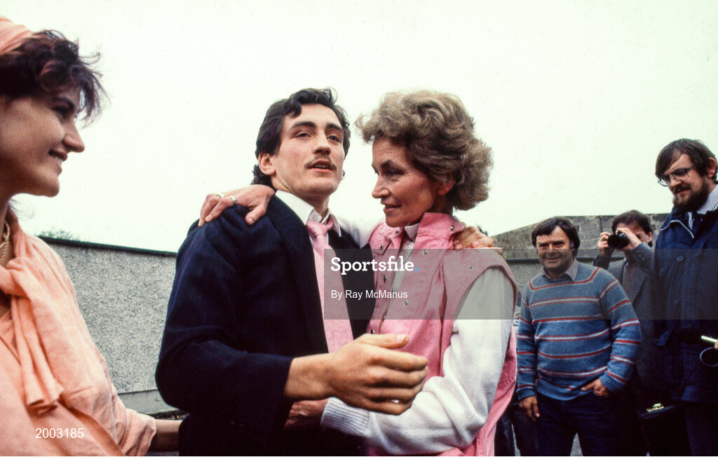 10 June 1985; World boxing featherweight champion Barry McGuigan, accompanied by his wife Sandra, left, is greeted by his mother Katie on his arrival home in Clones, Monaghan, on his return after beating Eusebio Pedroza at Loftus Road in London to win the world featherweight title. Photo by Ray McManus/Sportsfile