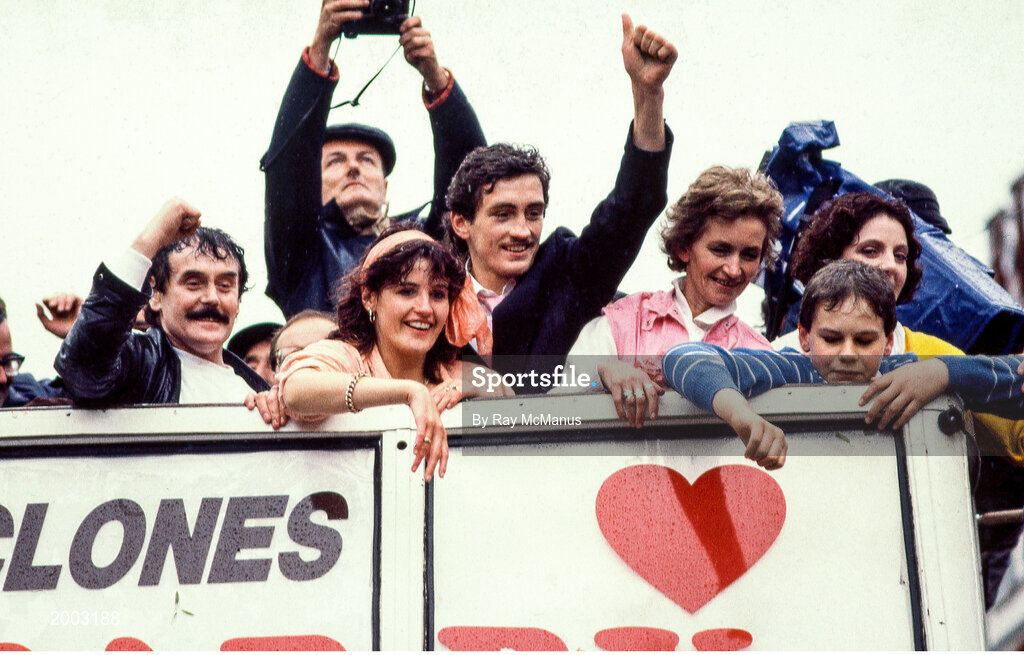 10 June 1985; World boxing featherweight champion Barry McGuigan, accompanied by his wife Sandra and parents Pat and Katie McGuigan, is brought by open top bus into his home town of Clones in Monaghan on his return after beating Eusebio Pedroza at Loftus Road in London to win the world featherweight title. Photo by Ray McManus/Sportsfile