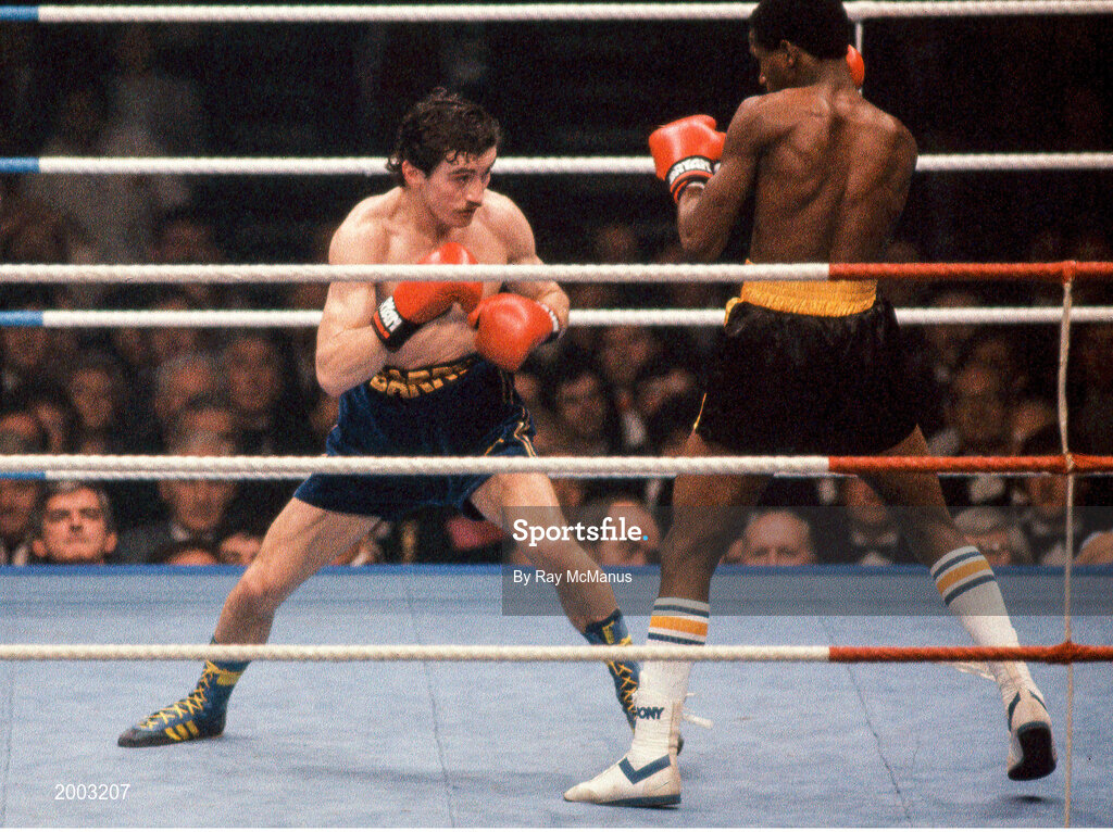 15 February 1986; Barry McGuigan, left, in action against Danilo Cabrera during their WBA World Featherweight Title Fight at the RDS in Dublin. Photo by Ray McManus/Sportsfile