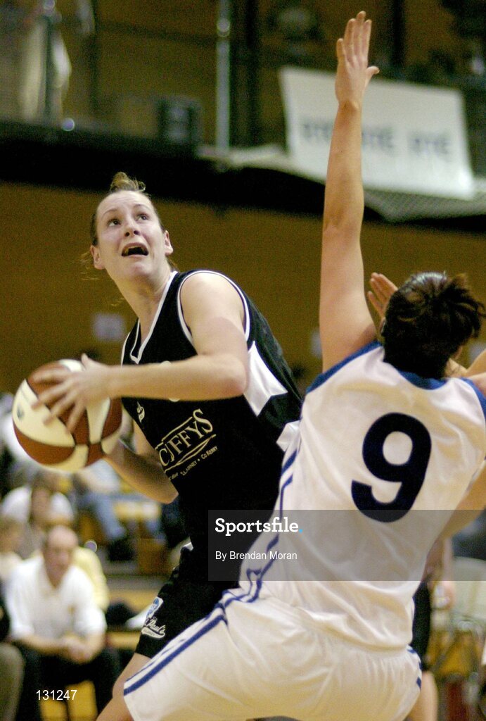30 January 2004; Caitriona O'Connell, Scruffy St. Paul's, in action against Grainne Dwyer, Bausch & Lomb Wildcats. ESB National Cup 2004, Senior Women's Semi-Final, Scruffy St. Paul's v Bausch & Lomb Wildcats, The ESB Arena, Tallaght, Dublin. Picture credit; Brendan Moran / SPORTSFILE *EDI*