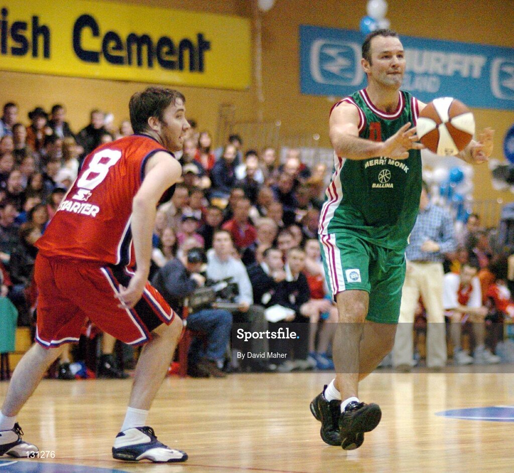 31 January 2004; Liam McHale, Team Monk, Ballina, in action against Shane Coughlan, Mardyke UCC Demons. ESB National Cup 2004, Senior Men's Semi-Final, Mardyke UCC Demons v Team Monk, Ballina, The ESB Arena, Tallaght, Dublin. Picture credit; David Maher / SPORTSFILE *EDI*