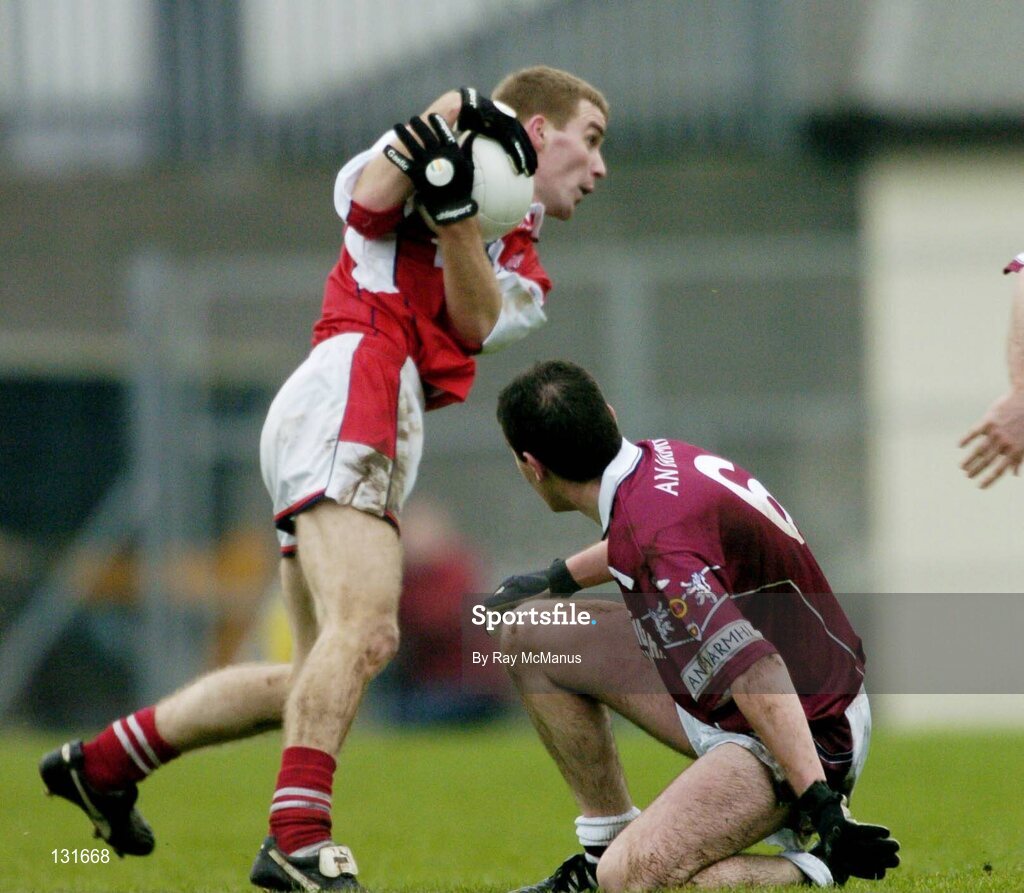 4 January 2004; David Brennan, Louth, in action against Aidan Canning, Westmeath. O'Byrne Cup, Westmeath v Louth, Cusack Park, Mullingar, Co. Westmeath. Picture credit; Ray McManus / SPORTSFILE *EDI*