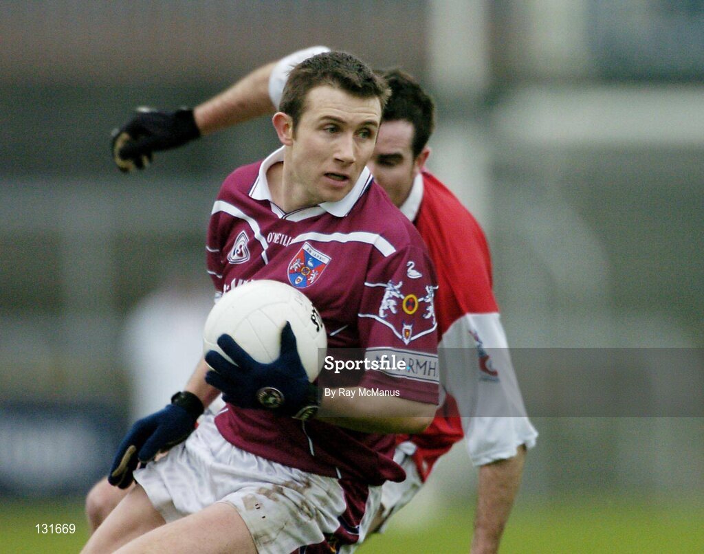 4 January 2004; Derek Heavin, Westmeath, in action against Alan McCarthy, Louth. O'Byrne Cup, Westmeath v Louth, Cusack Park, Mullingar, Co. Westmeath. Picture credit; Ray McManus / SPORTSFILE *EDI*