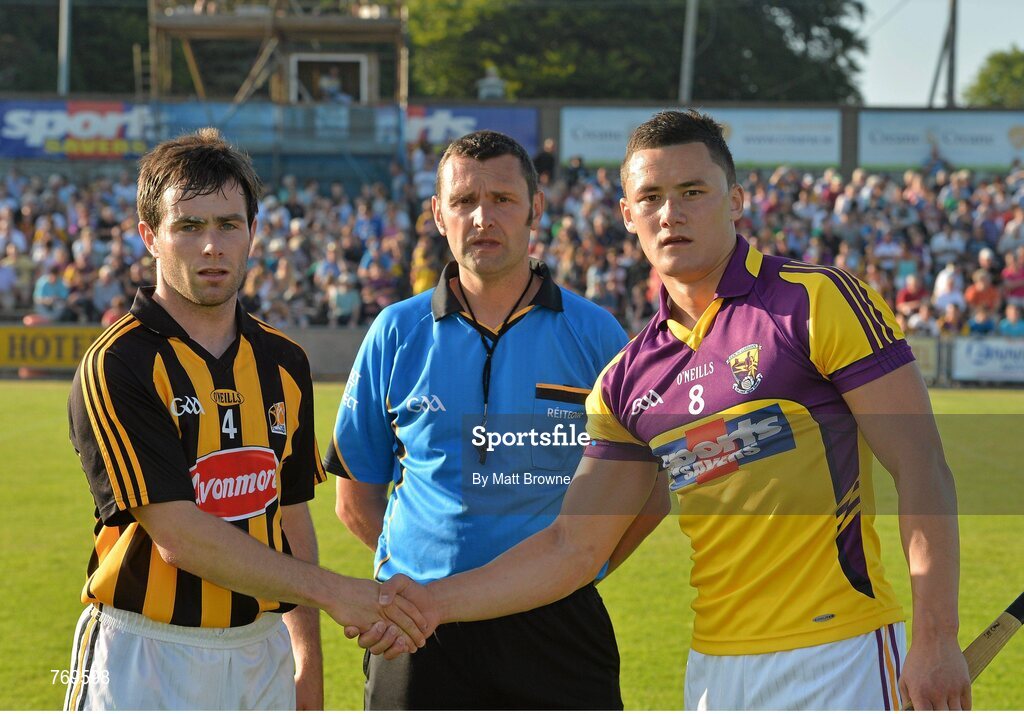 10 July 2013; Referee Pat Murphy with Kilkenny captain Brian Kennedy and Wexford captain Lee Chin before the game. Bord Gáis Energy Leinster GAA Hurling Under 21 Championship Final, Kilkenny v Wexford, Wexford Park, Wexford. Picture credit: Matt Browne / SPORTSFILE