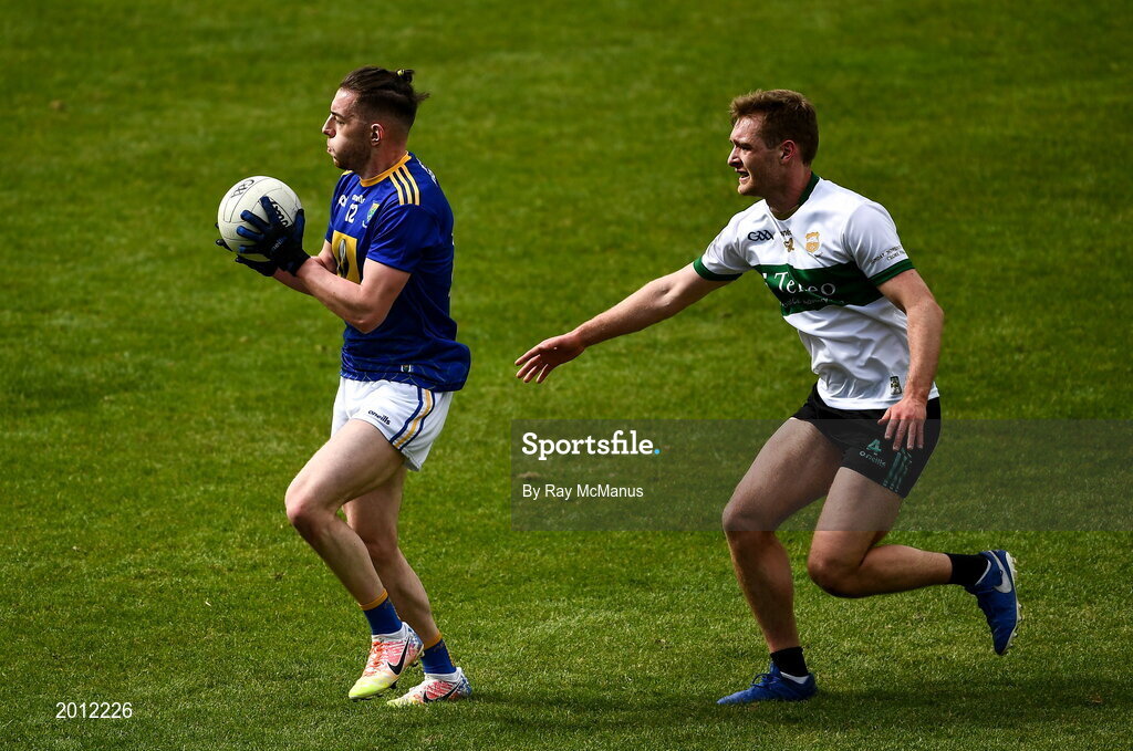 22 May 2021; Conor Byrne of Wicklow in action against Colm O'Shaughnessy of Tipperary during the Allianz Football League Division 3 South Round 2 match between Tipperary and Wicklow at Semple Stadium in Thurles, Tipperary. Photo by Ray McManus/Sportsfile