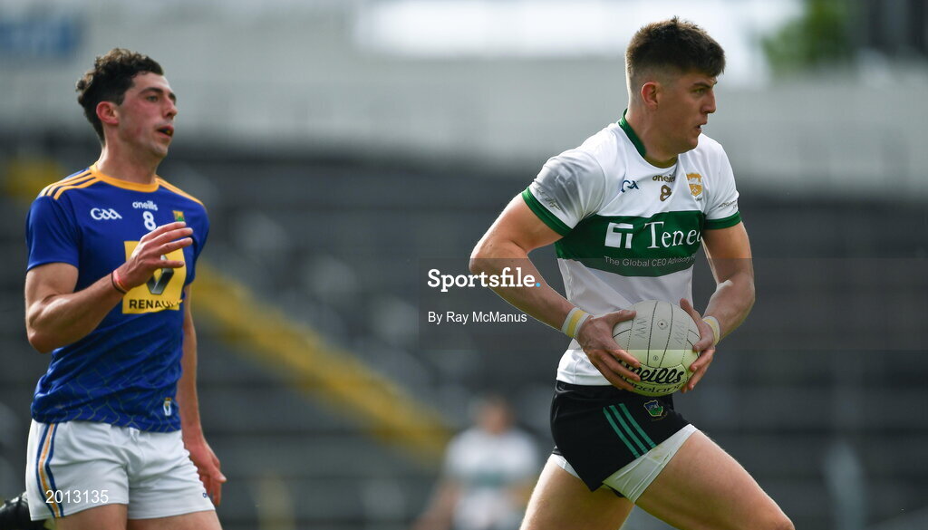 22 May 2021; Steven O'Brien of Tipperary races clear of his opposite number Podge O'Toole of Wicklow during the Allianz Football League Division 3 South Round 2 match between Tipperary and Wicklow at Semple Stadium in Thurles, Tipperary. Photo by Ray McManus/Sportsfile