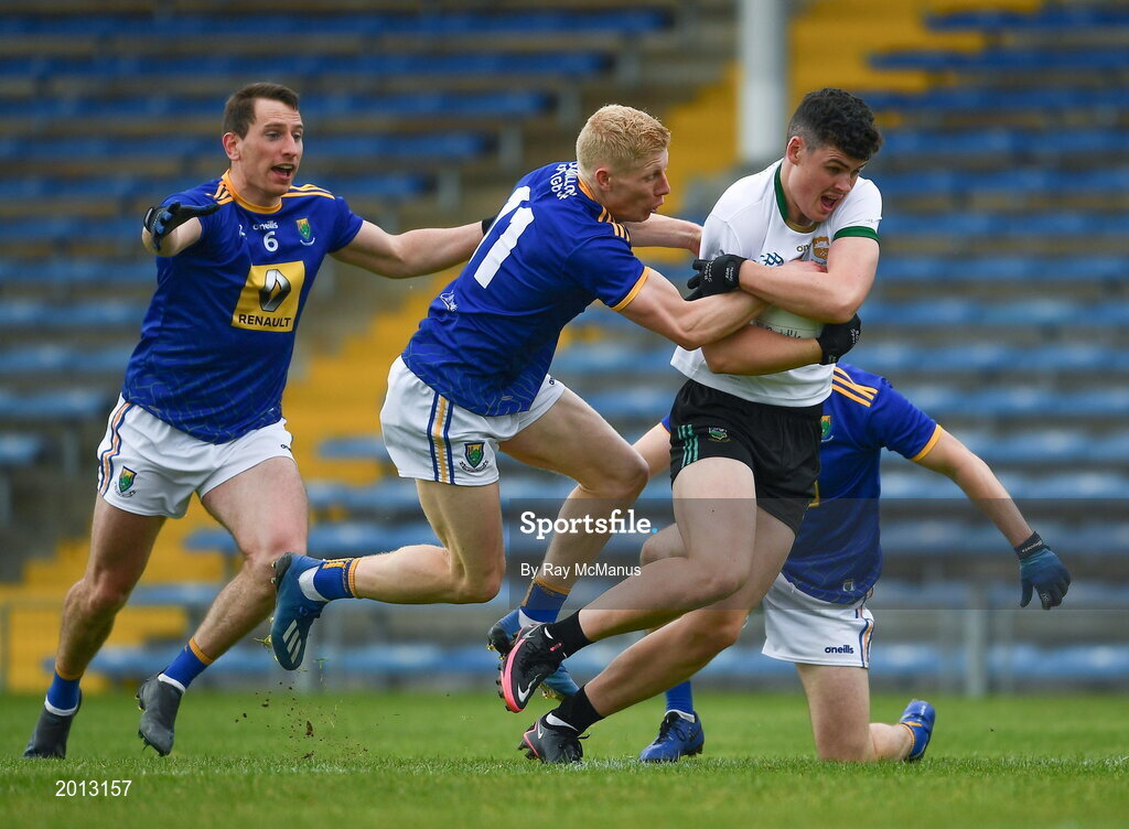 22 May 2021; Sean O'Connor of Tipperary breaks clear of Wicklow players Niall Donnolly, 6, Mark Kenny, 11, and Oisín Manning during the Allianz Football League Division 3 South Round 2 match between Tipperary and Wicklow at Semple Stadium in Thurles, Tipperary. Photo by Ray McManus/Sportsfile