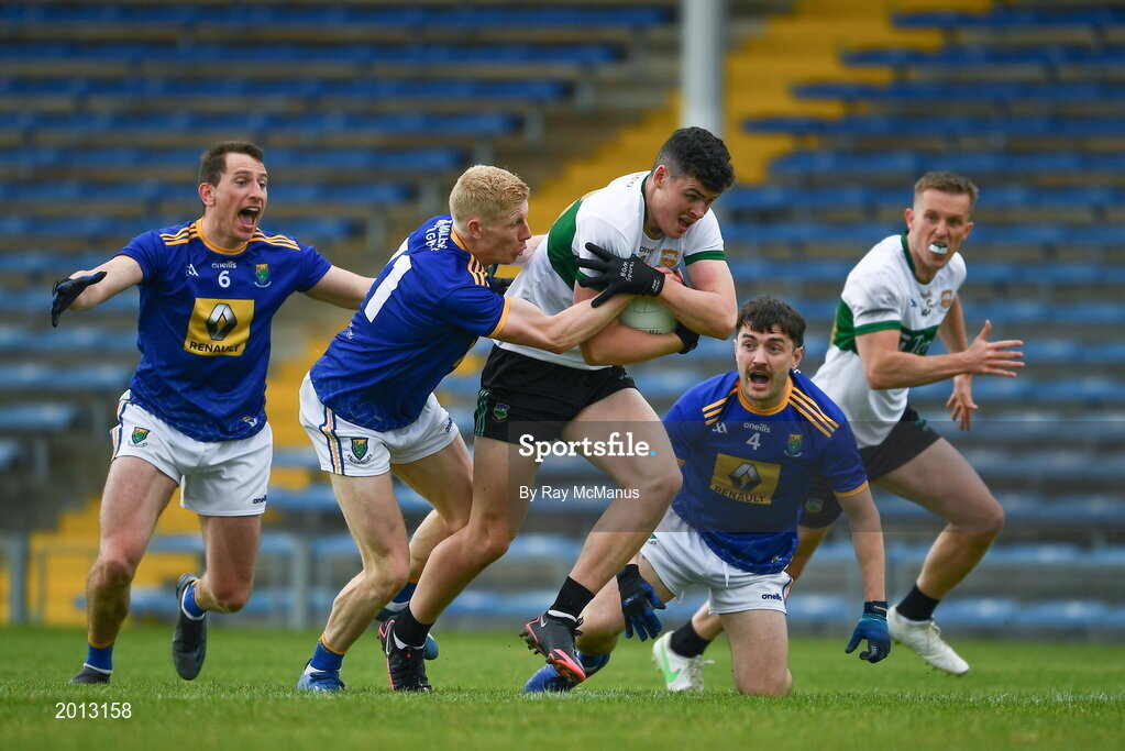 22 May 2021; Sean O'Connor of Tipperary breaks clear of Wicklow players Niall Donnolly, 6, Mark Kenny, 11, and Oisín Manning during the Allianz Football League Division 3 South Round 2 match between Tipperary and Wicklow at Semple Stadium in Thurles, Tipperary. Photo by Ray McManus/Sportsfile