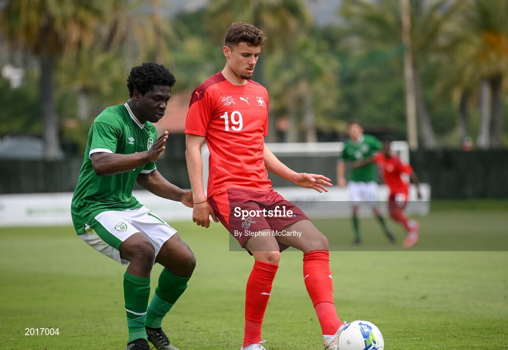30 May 2021; Darian Males of Switzerland in action against Festy Ebosele of Republic of Ireland during the U21 international friendly match between Switzerland and Republic of Ireland at Dama de Noche Football Centre in Marbella, Spain. Photo by Stephen McCarthy/Sportsfile