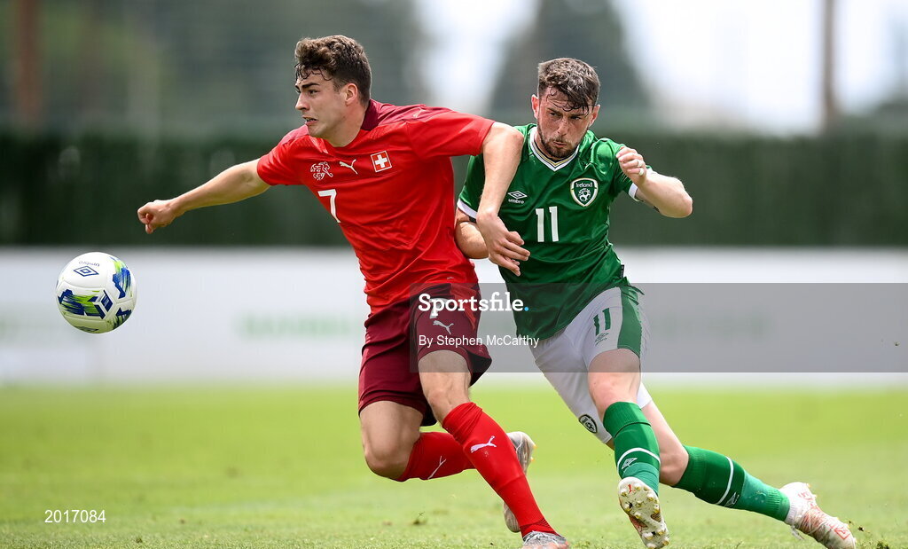 30 May 2021; Tim Staubli of Switzerland in action against Will Ferry of Republic of Ireland during the U21 international friendly match between Switzerland and Republic of Ireland at Dama de Noche Football Centre in Marbella, Spain. Photo by Stephen McCarthy/Sportsfile