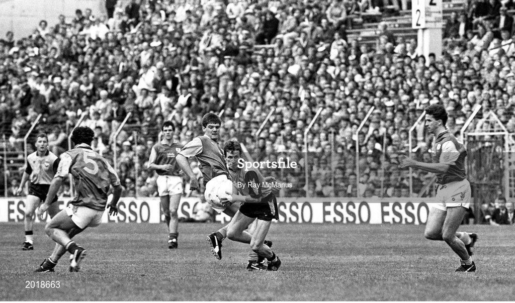2 June 1991; Niall Guiden of Dublin in action against Meath players, from left, Kevin Foley, PJ Gillic and Liam Hayes during the Leinster Senior Football Championship Preliminary Round match between Dublin and Meath at Croke Park in Dublin. Photo by Ray McManus/Sportsfile
