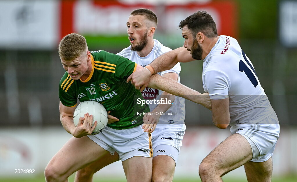 13 June 2021; Mathew Costello of Meath is tackled by Neil Flynn and Fergal Conway, right, of Kildare during the Allianz Football League Division 2 semi-final match between Kildare and Meath at St Conleth's Park in Newbridge, Kildare. Photo by Piaras Ó Mídheach/Sportsfile